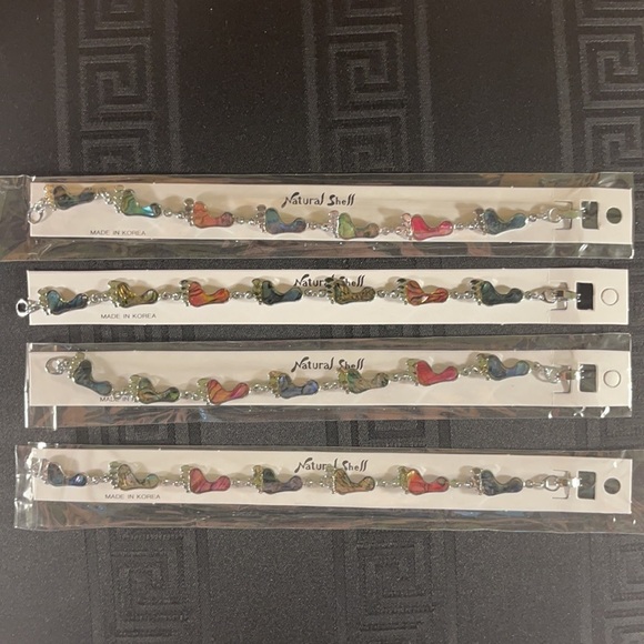 👋 3/$15 FASHION JEWERLY FOOTPRINTS BRACELET ❤️ - Picture 2 of 4